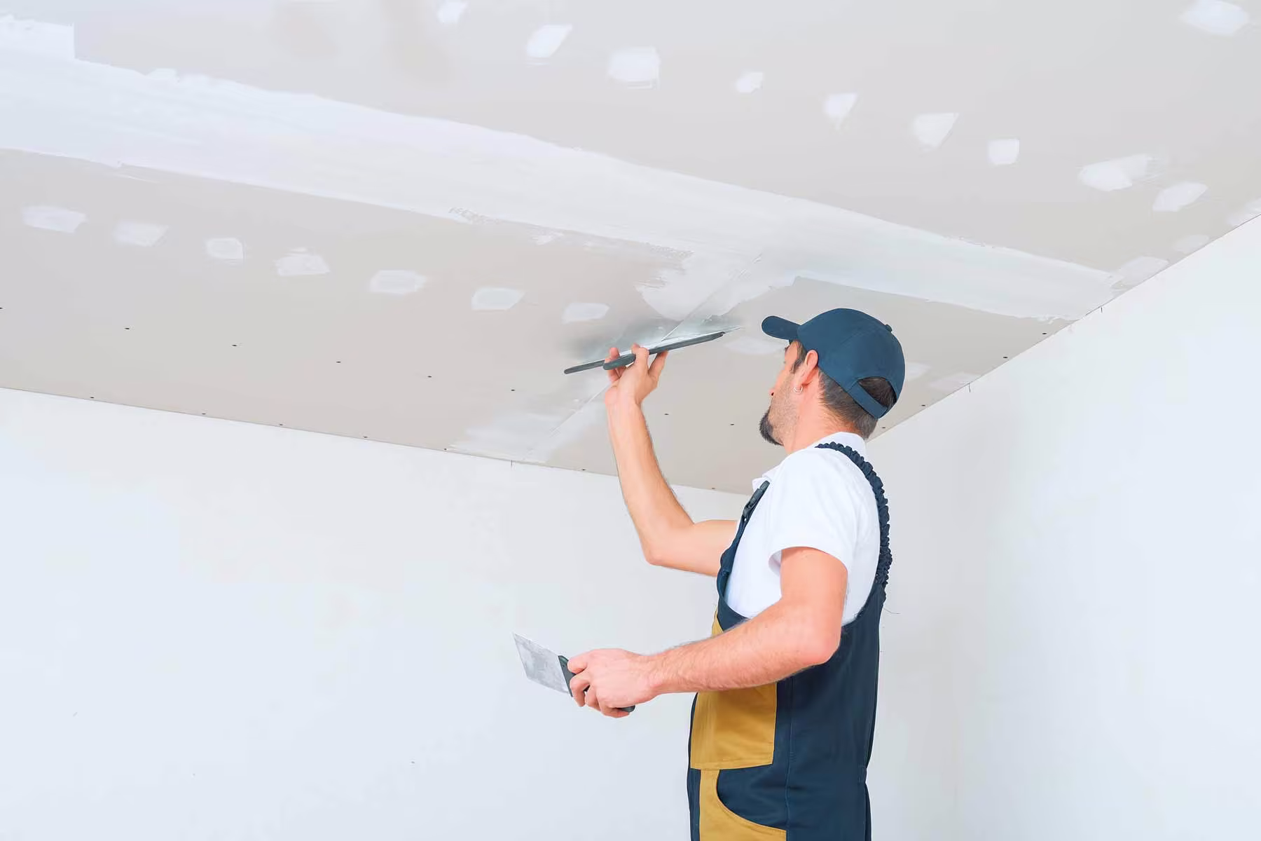 Skilled Update Home professional performing expert drywall repair, ensuring a home in King County, WA remains beautiful and structurally sound