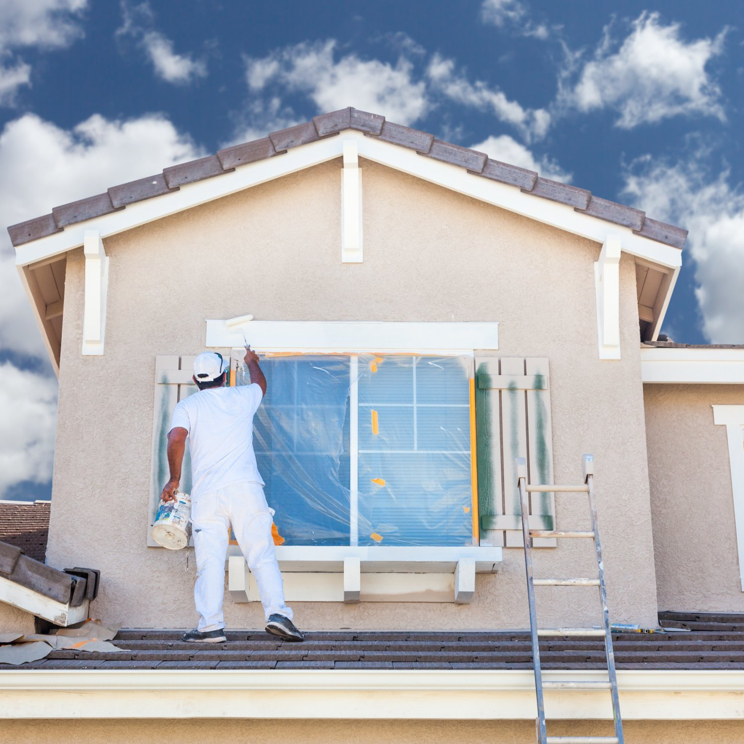 Expert painter applying meticulous brush strokes on a vibrant living room wall in King County